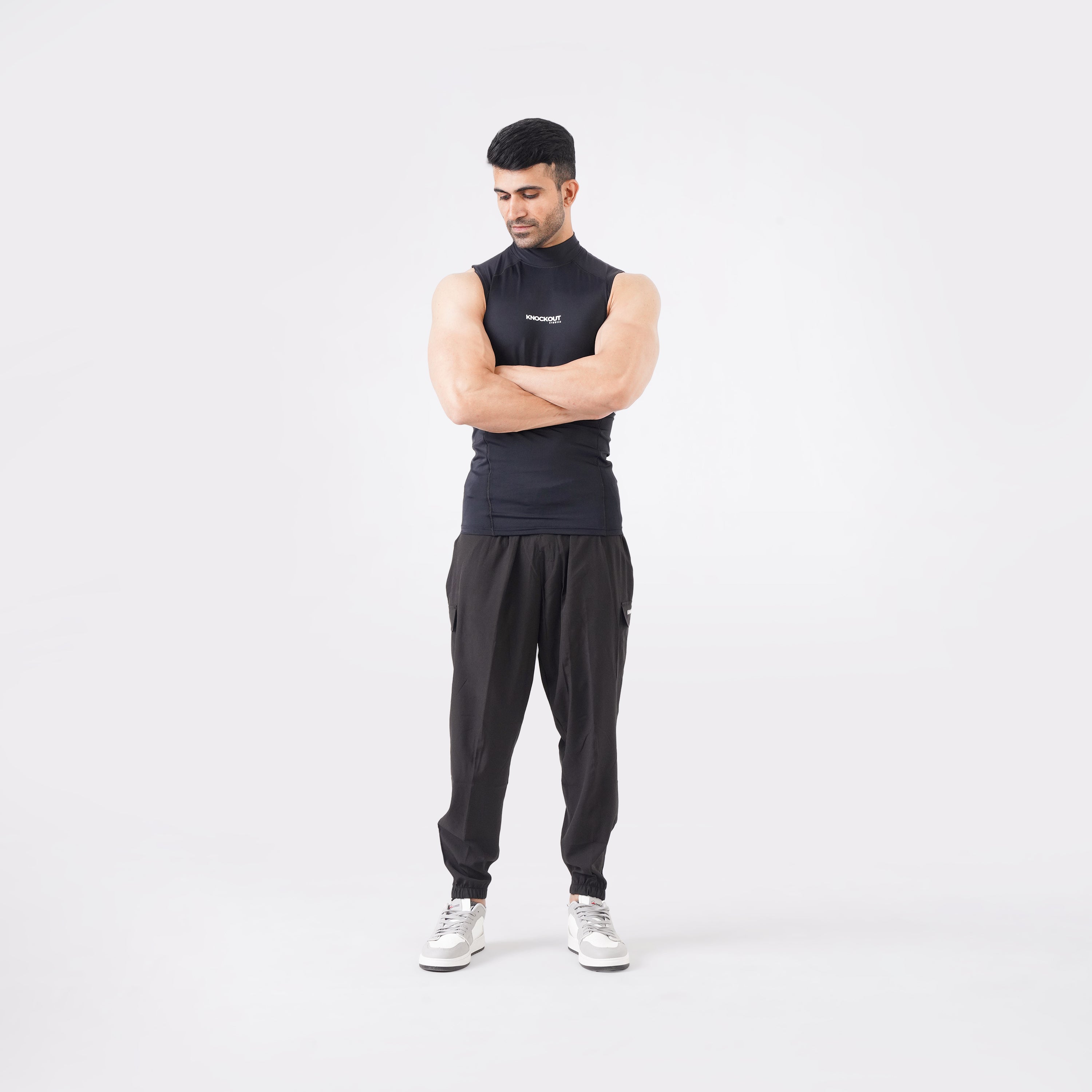 Black sleeveless compression shirt for men’s activewear