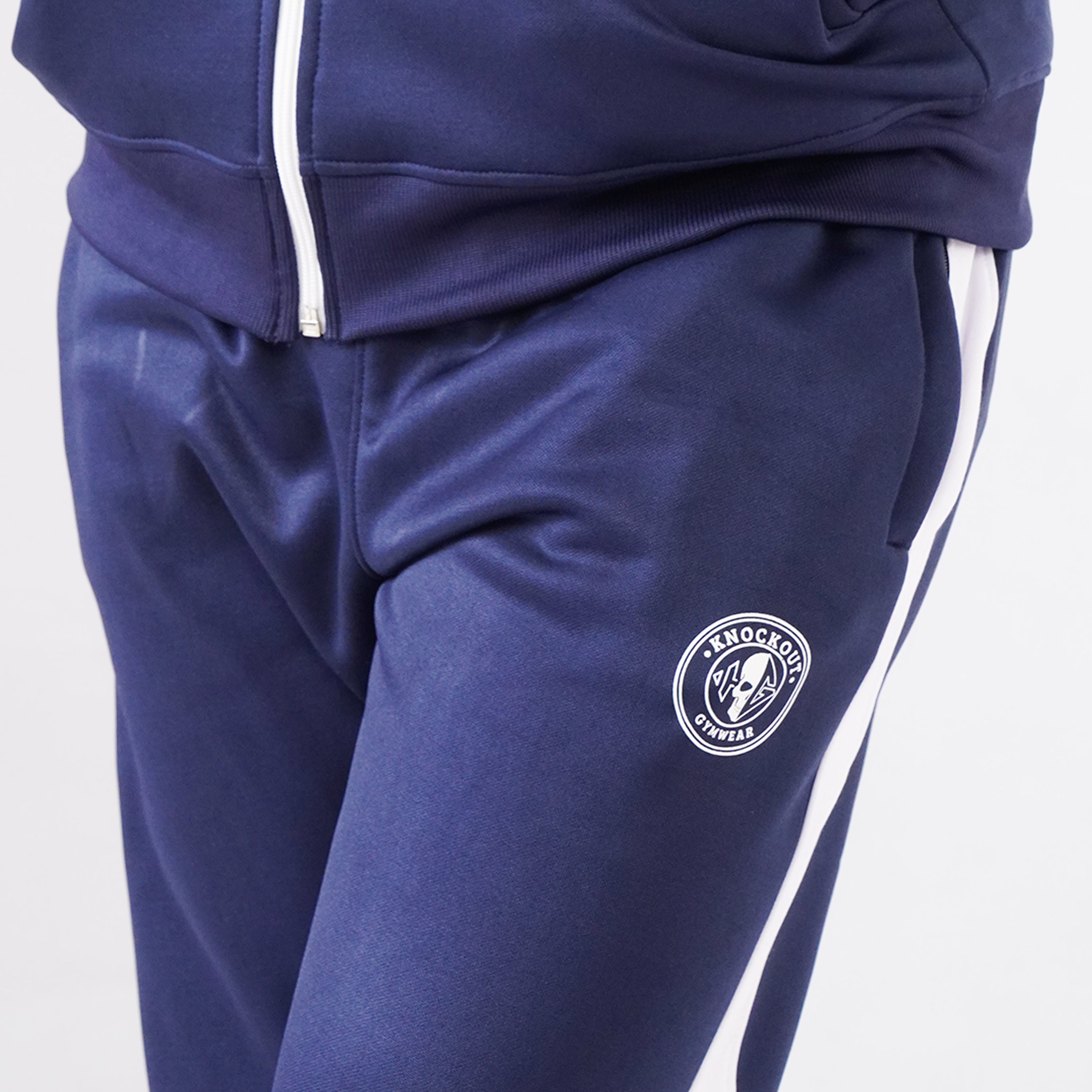 Men’s navy blue athletic tracksuit with side stripes for gym and casual style.