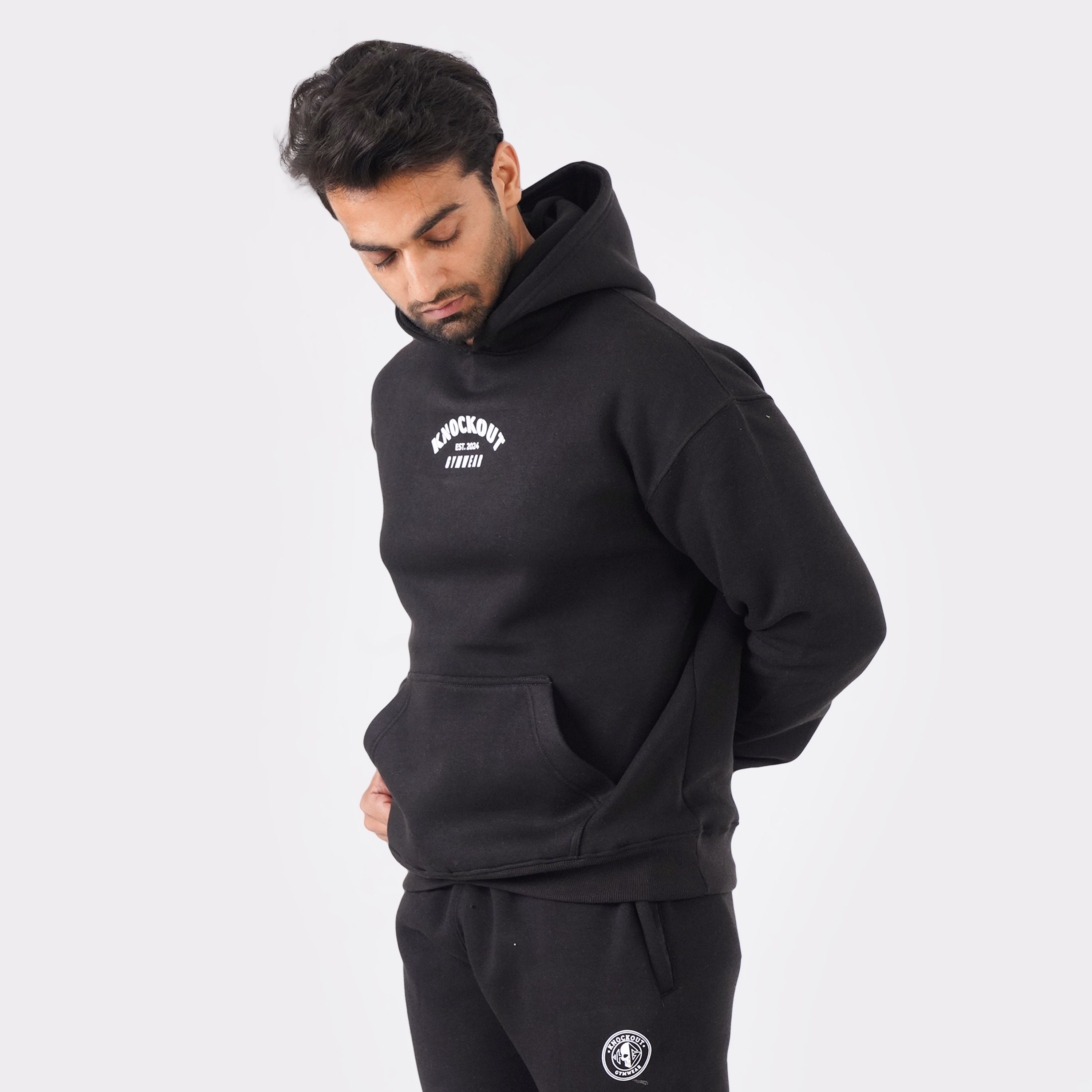 Black oversized tracksuit for men with a relaxed, comfortable fit.