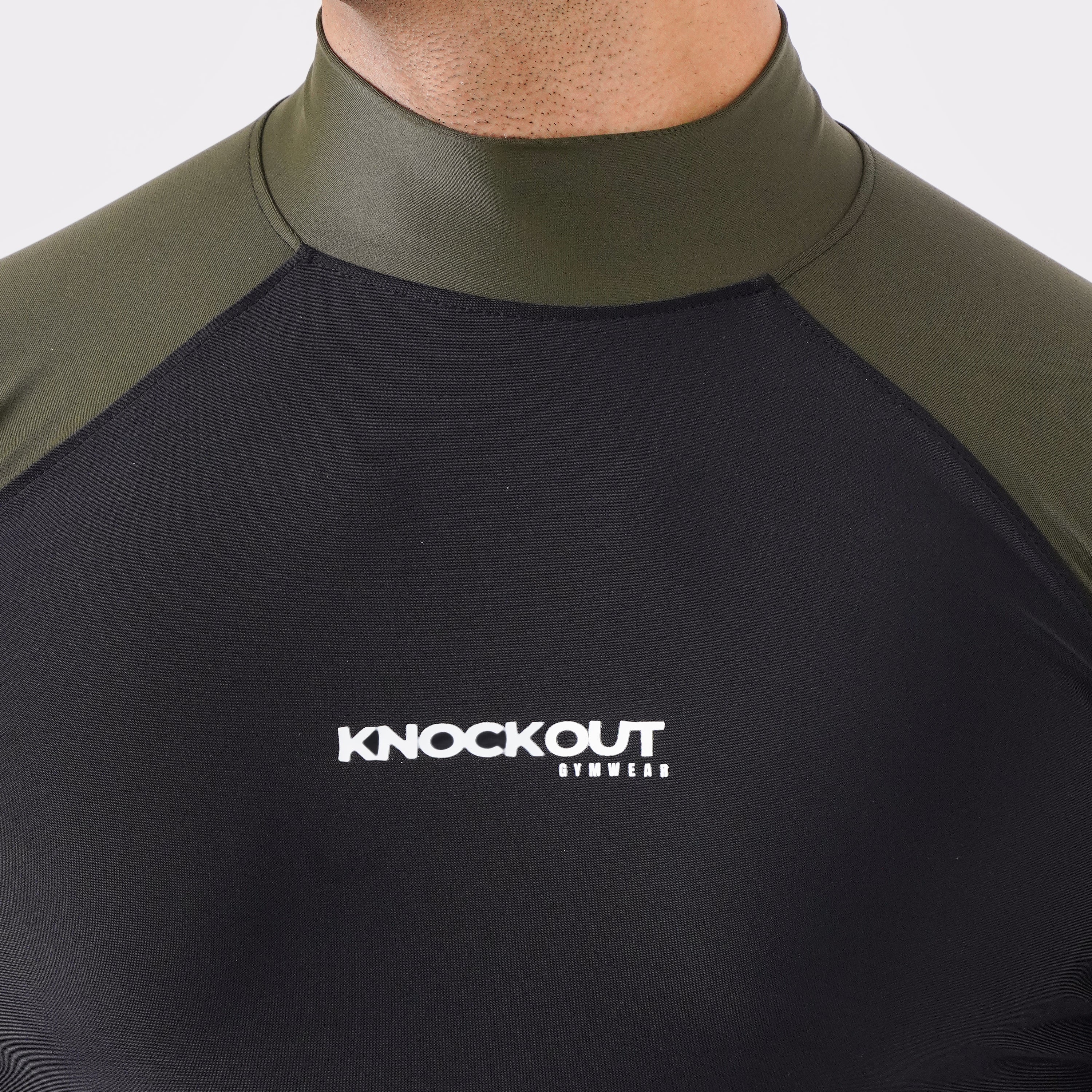Knockout Black and Green high-neck long sleeve compression shirt