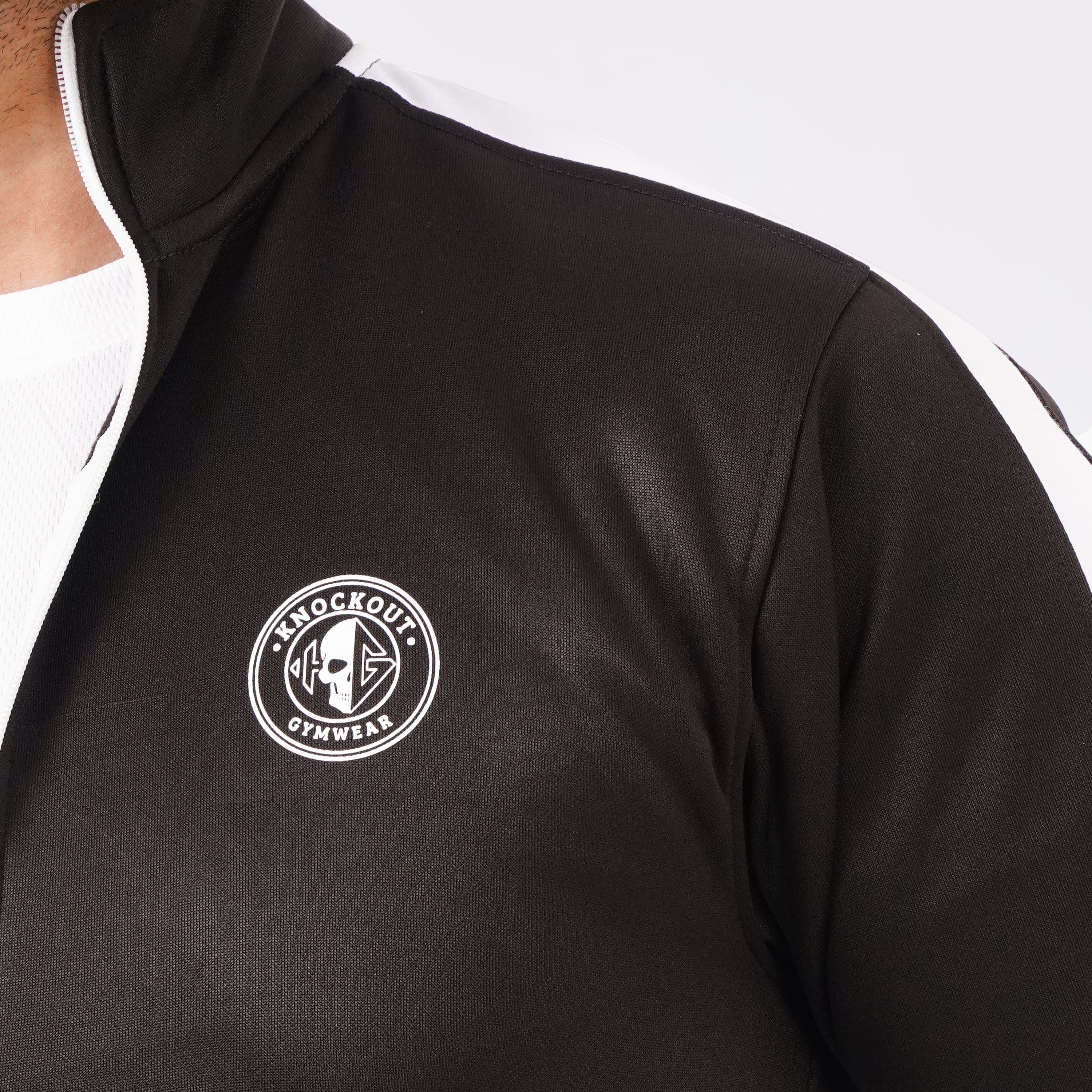 Men’s Chocolate athletic tracksuit with side stripes for gym and casual style.
