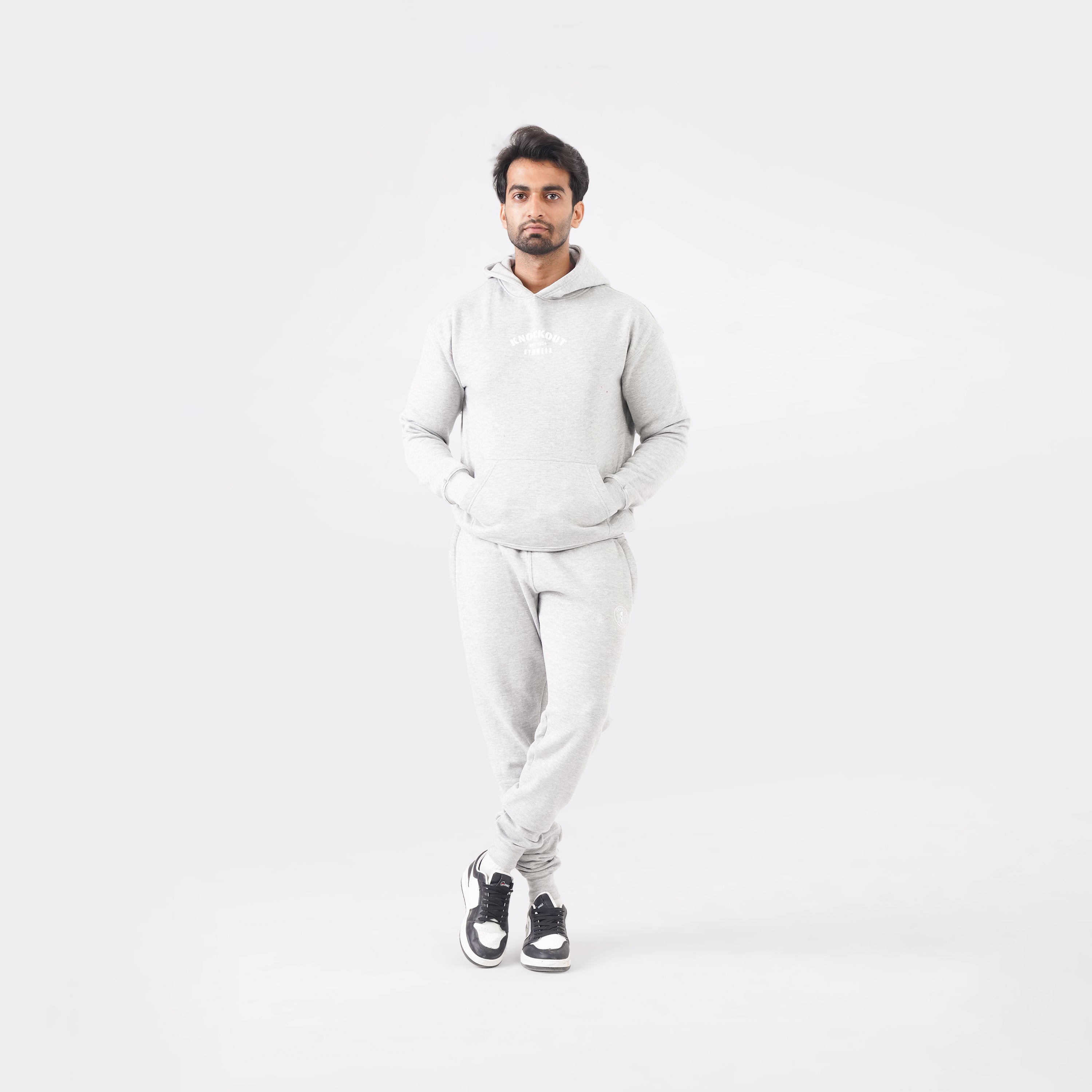 Grey oversized tracksuit for men with a relaxed, comfortable fit.
